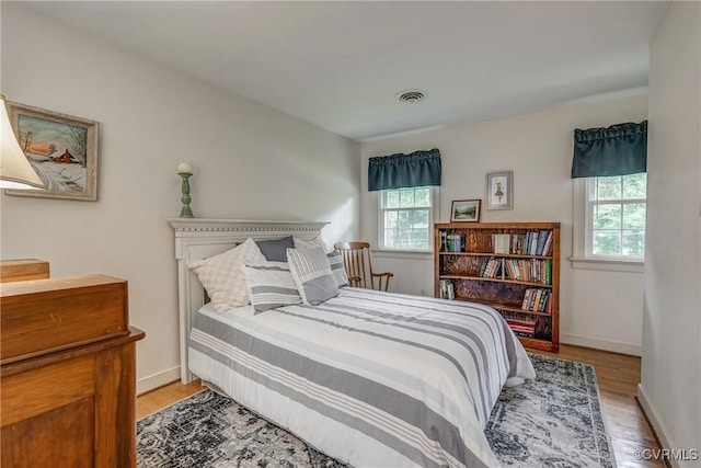 10903 Gayton Rd, Henrico, VA 23238 - bedroom with multiple windows and light wood-style floors
