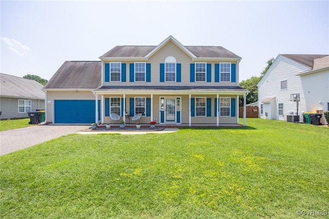 3706 Paul Karnes Dr, Hopewell, VA 23860 - colonial home featuring a garage, driveway, a porch, and a front yard