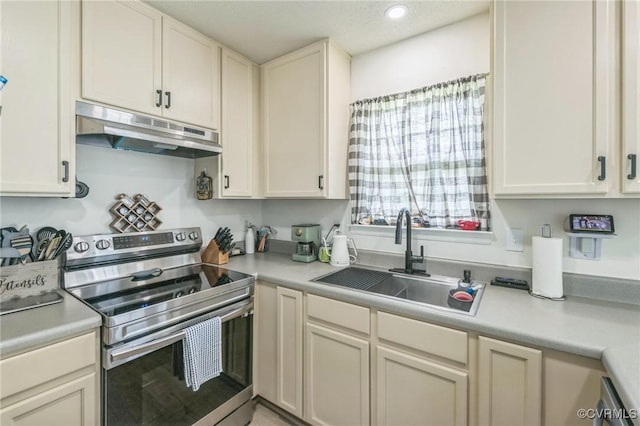 3706 Paul Karnes Dr, Hopewell, VA 23860 - kitchen with electric range, under cabinet range hood, light countertops, recessed lighting, and dishwasher