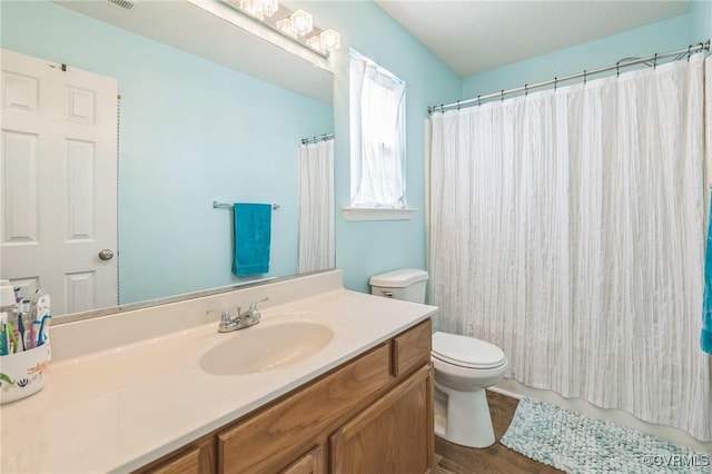 3706 Paul Karnes Dr, Hopewell, VA 23860 - full bath featuring vanity, wood finished floors, and curtained shower