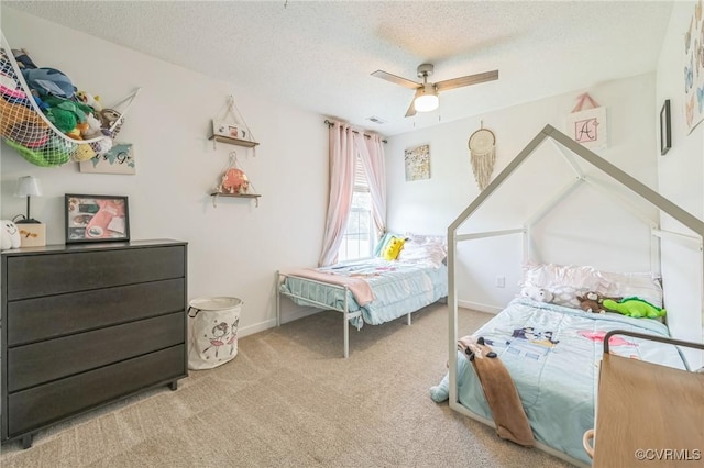 3706 Paul Karnes Dr, Hopewell, VA 23860 - bedroom featuring carpet flooring, a textured ceiling, and ceiling fan