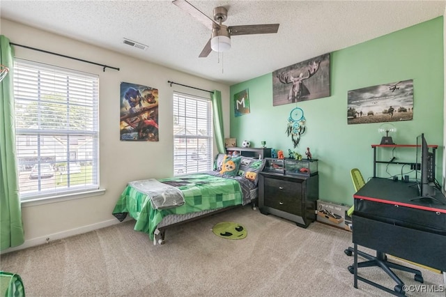 3706 Paul Karnes Dr, Hopewell, VA 23860 - bedroom with carpet, a textured ceiling, and a ceiling fan