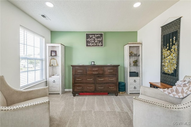 3706 Paul Karnes Dr, Hopewell, VA 23860 - living area featuring light colored carpet, a textured ceiling, and recessed lighting
