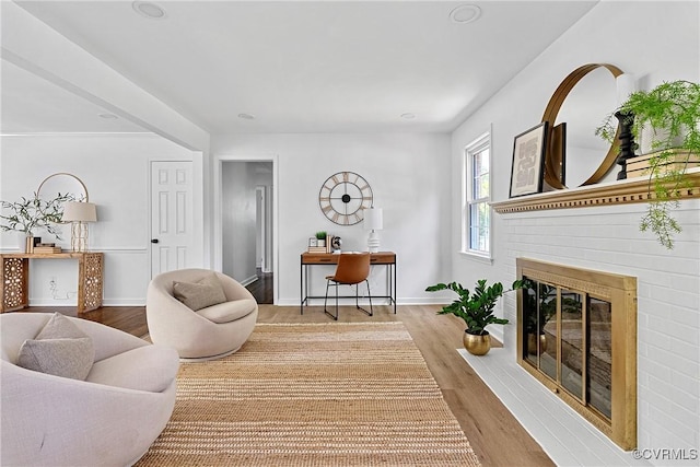 1908 Windsordale Dr, Henrico, VA 23229 - living room featuring wood finished floors, a fireplace, and an office area