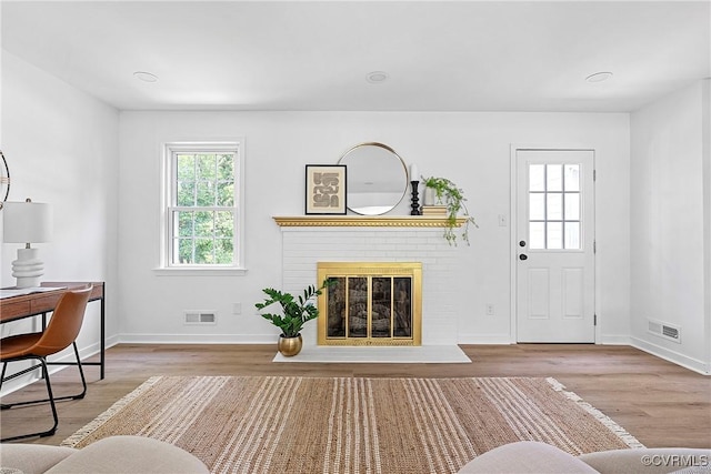1908 Windsordale Dr, Henrico, VA 23229 - living area featuring wood finished floors and a fireplace