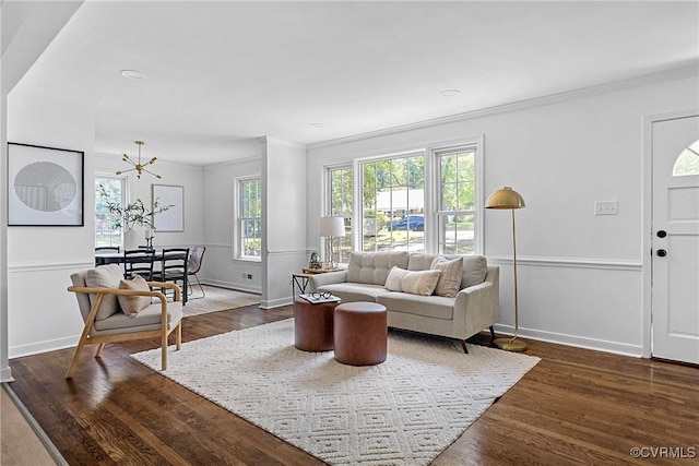 1908 Windsordale Dr, Henrico, VA 23229 - living area featuring ornamental molding, a chandelier, and dark wood-style floors