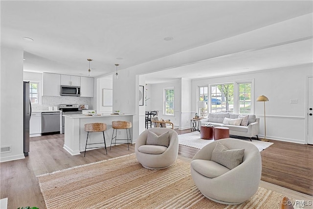1908 Windsordale Dr, Henrico, VA 23229 - living area featuring light wood-type flooring
