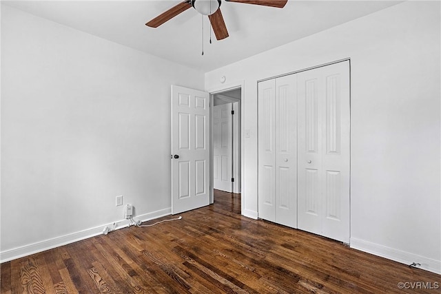 1908 Windsordale Dr, Henrico, VA 23229 - unfurnished bedroom featuring dark wood-style floors, a closet, and a ceiling fan