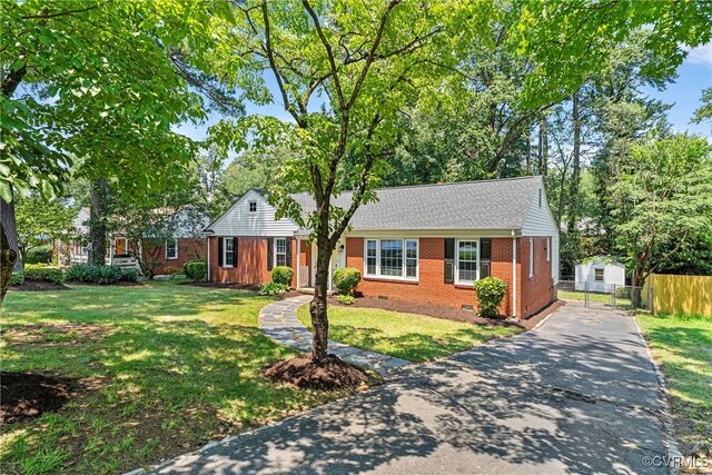 1908 Windsordale Dr, Henrico, VA 23229 - ranch-style home with driveway, crawl space, brick siding, a shed, and a shingled roof