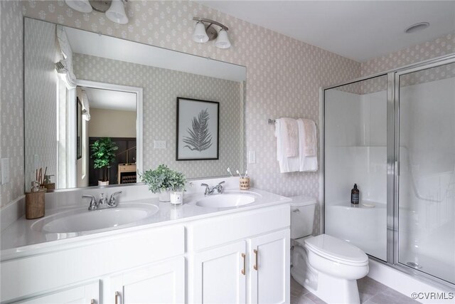 14645 Hancock Towns Dr Unit P-5, Chesterfield, VA 23832 - full bathroom featuring wallpapered walls, double vanity, a stall shower, and tile patterned flooring