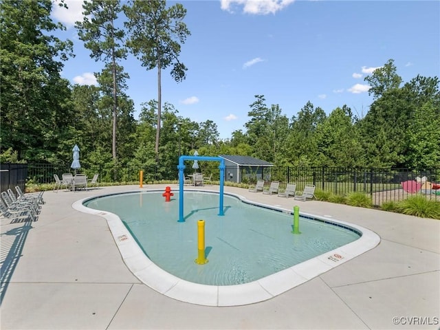 6017 Banyan Ln, Chesterfield, VA 23234 - community pool with a patio area and view of scattered trees