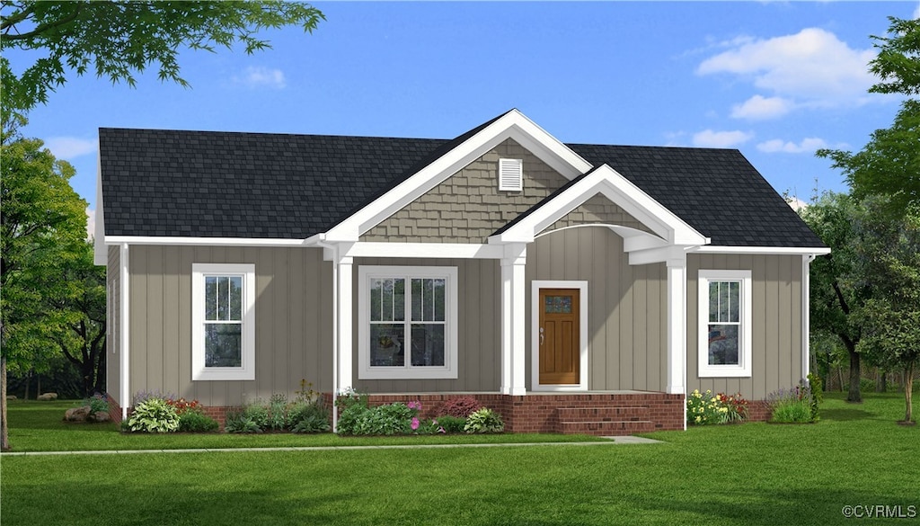 431 Raleigh Ave, South Hill, VA 23970 - view of front of property with a front yard, board and batten siding, and a shingled roof