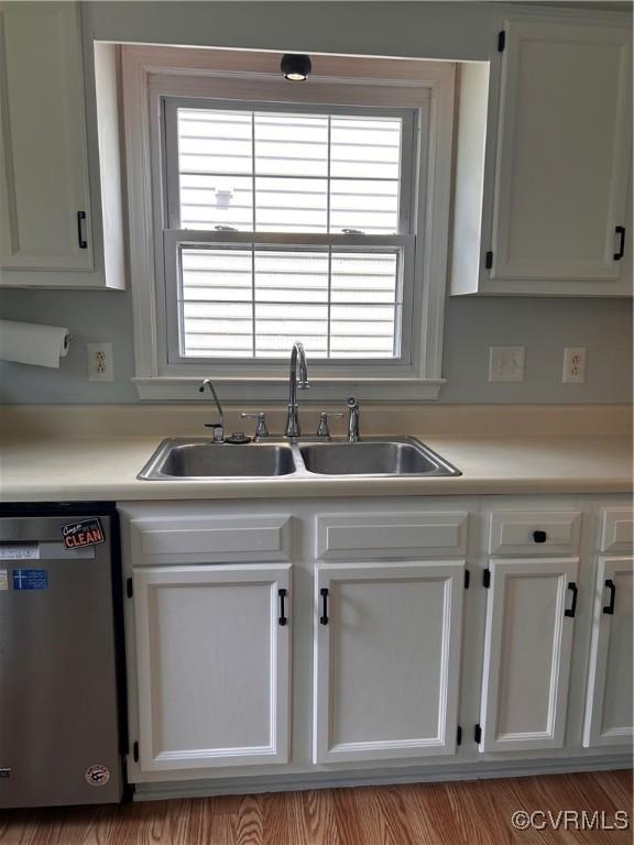 6033 Ironworks Ct, Mechanicsville, VA 23111 - kitchen with stainless steel dishwasher and white cabinetry