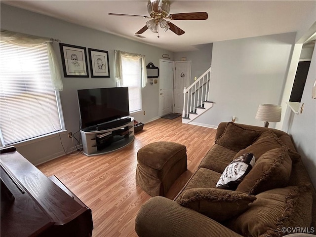 6033 Ironworks Ct, Mechanicsville, VA 23111 - living area with stairway, ceiling fan, and wood finished floors