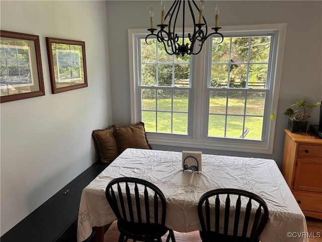 6033 Ironworks Ct, Mechanicsville, VA 23111 - dining room with a chandelier and healthy amount of natural light