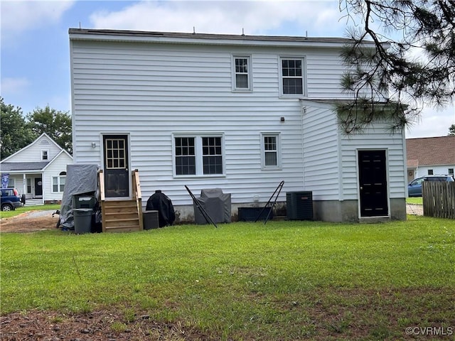 6033 Ironworks Ct, Mechanicsville, VA 23111 - rear view of house featuring a lawn and entry steps