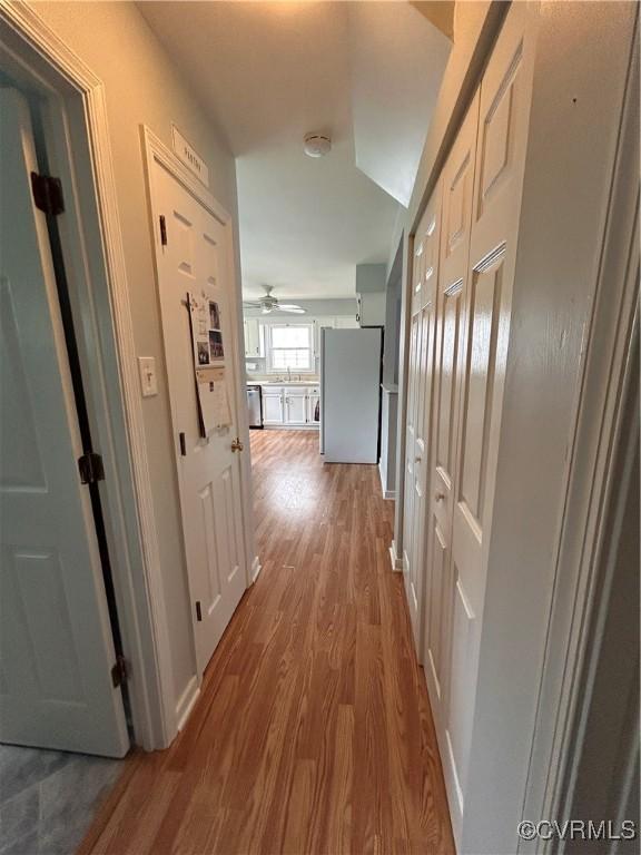 6033 Ironworks Ct, Mechanicsville, VA 23111 - hallway featuring wood finished floors and a sink
