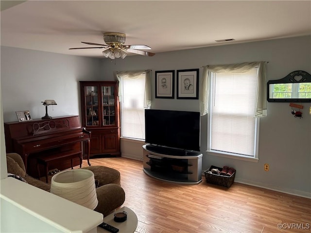 6033 Ironworks Ct, Mechanicsville, VA 23111 - living area with ceiling fan and light wood-style flooring