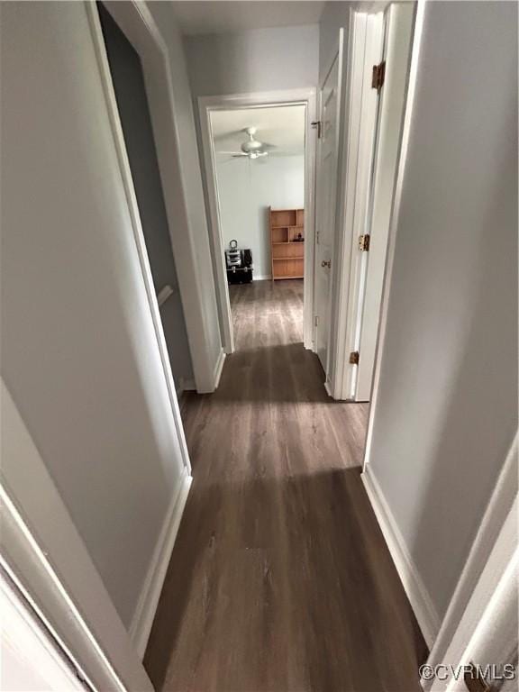 6033 Ironworks Ct, Mechanicsville, VA 23111 - corridor with dark wood-type flooring and baseboards
