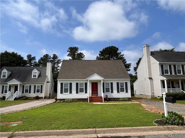 6033 Ironworks Ct, Mechanicsville, VA 23111 - new england style home featuring driveway, crawl space, a front lawn, and a chimney
