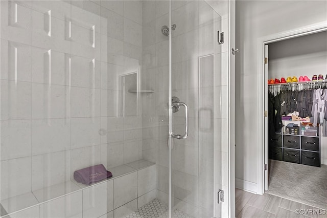 7001 Leire Ln, Chesterfield, VA 23832 - bathroom featuring a shower stall and a walk in closet