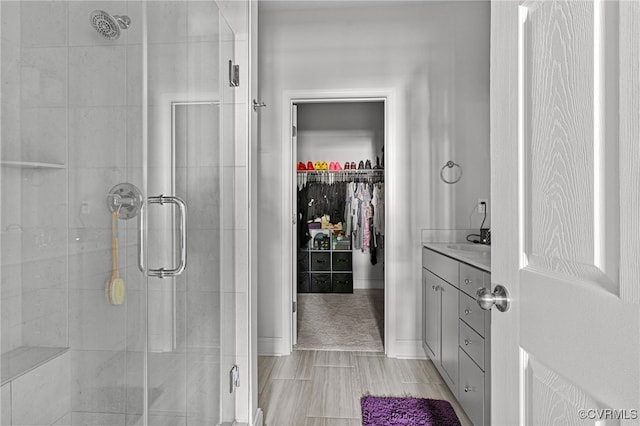 7001 Leire Ln, Chesterfield, VA 23832 - full bath featuring a shower stall, vanity, and a spacious closet