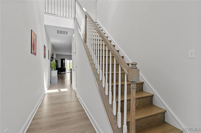 7001 Leire Ln, Chesterfield, VA 23832 - stairway with wood finished floors and a high ceiling