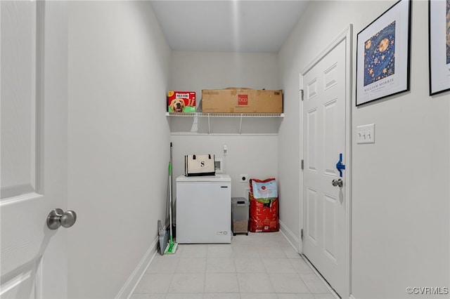 7001 Leire Ln, Chesterfield, VA 23832 - laundry area featuring washer / dryer and light tile patterned floors