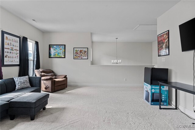 7001 Leire Ln, Chesterfield, VA 23832 - living room with carpet, attic access, and a chandelier