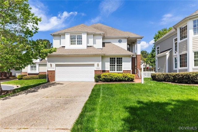 5908 Dominion Fairways Ct, Glen Allen, VA 23059 - traditional home with brick siding, an attached garage, driveway, and a front yard
