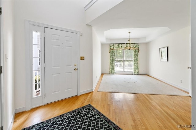 5908 Dominion Fairways Ct, Glen Allen, VA 23059 - entrance foyer with wood finished floors and a chandelier