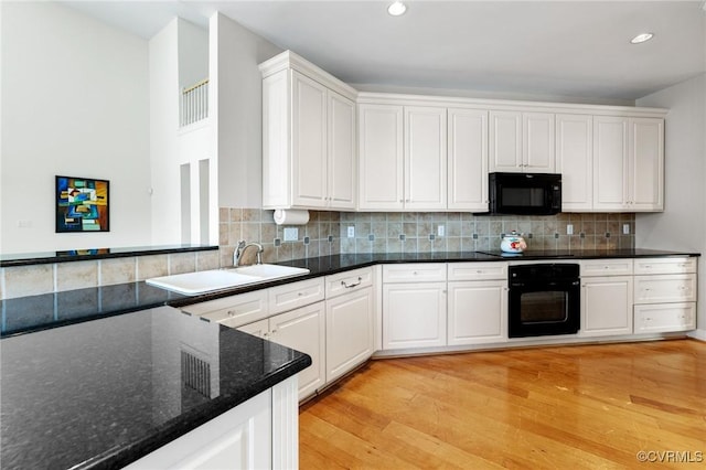 5908 Dominion Fairways Ct, Glen Allen, VA 23059 - kitchen featuring black appliances, light wood finished floors, white cabinetry, decorative backsplash, and recessed lighting