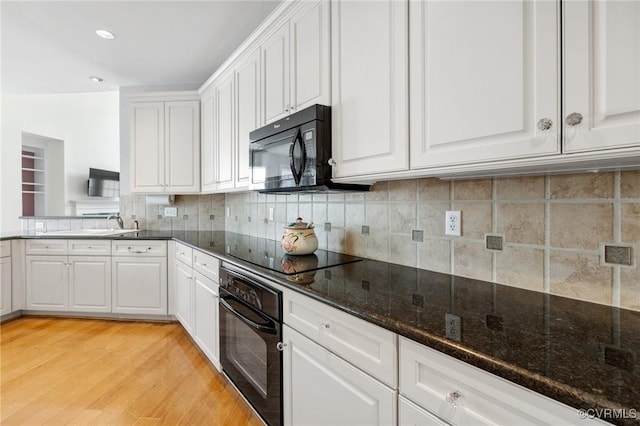 5908 Dominion Fairways Ct, Glen Allen, VA 23059 - kitchen with black appliances, white cabinetry, light wood-style floors, backsplash, and recessed lighting