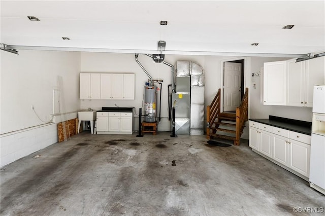 5908 Dominion Fairways Ct, Glen Allen, VA 23059 - garage featuring water heater and heating unit