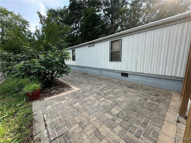 2305 Swift Bluff Dr, South Chesterfield, VA 23834 - view of property exterior featuring crawl space and a patio area