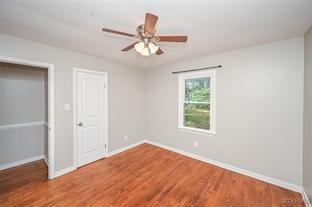 2131 Highland Dr, Powhatan, VA 23139 - unfurnished bedroom featuring wood finished floors and a ceiling fan