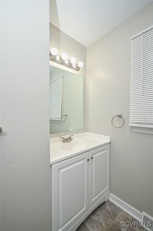 2131 Highland Dr, Powhatan, VA 23139 - bathroom featuring vanity and baseboards