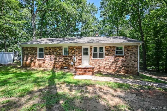 2131 Highland Dr, Powhatan, VA 23139 - rear view of property with brick siding and a chimney