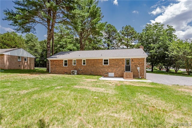 4300 N Courthouse Rd, Providence Forge, VA 23140 - back of property with entry steps, a chimney, a lawn, brick siding, and crawl space