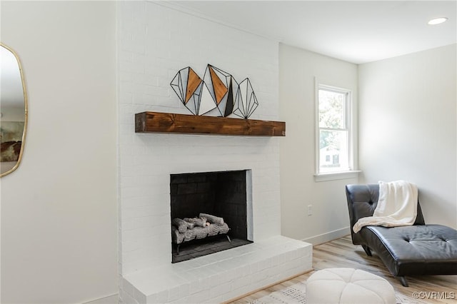 4300 N Courthouse Rd, Providence Forge, VA 23140 - living room featuring wood finished floors, a brick fireplace, and recessed lighting