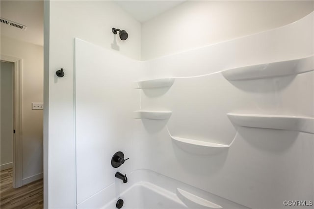 4300 N Courthouse Rd, Providence Forge, VA 23140 - full bathroom featuring washtub / shower combination and wood finished floors