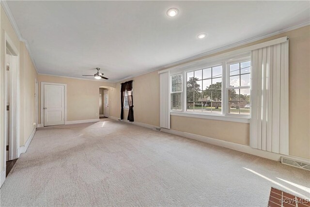 4305 Lakeview Rd, South Chesterfield, VA 23803 - unfurnished living room with ornamental molding, light carpet, arched walkways, ceiling fan, and recessed lighting