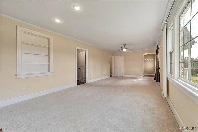 4305 Lakeview Rd, South Chesterfield, VA 23803 - unfurnished room featuring light colored carpet, arched walkways, a ceiling fan, healthy amount of natural light, and crown molding