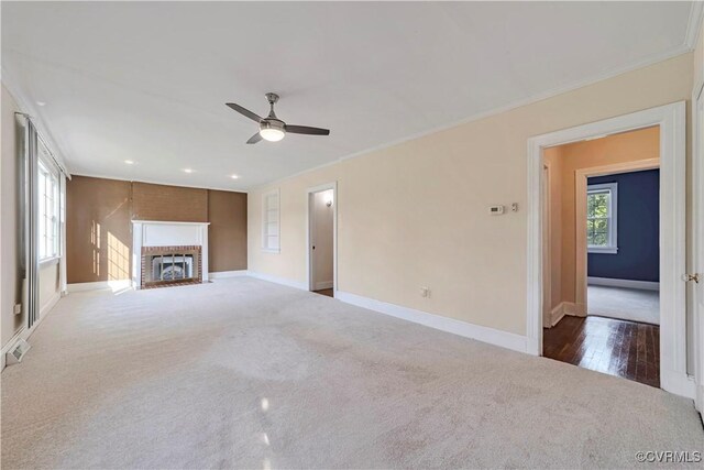 4305 Lakeview Rd, South Chesterfield, VA 23803 - unfurnished living room featuring carpet, ceiling fan, a fireplace, ornamental molding, and recessed lighting