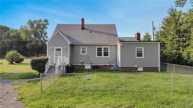4305 Lakeview Rd, South Chesterfield, VA 23803 - back of house with a chimney, a fenced backyard, entry steps, and crawl space
