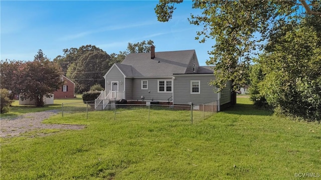 4305 Lakeview Rd, South Chesterfield, VA 23803 - back of property featuring a chimney and roof with shingles