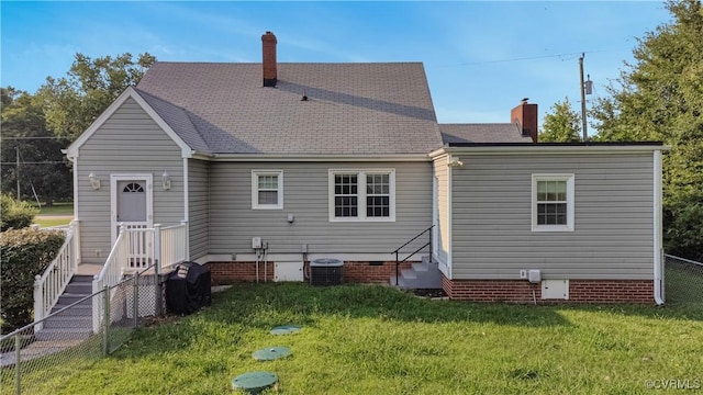 4305 Lakeview Rd, South Chesterfield, VA 23803 - rear view of house with a chimney, crawl space, and entry steps