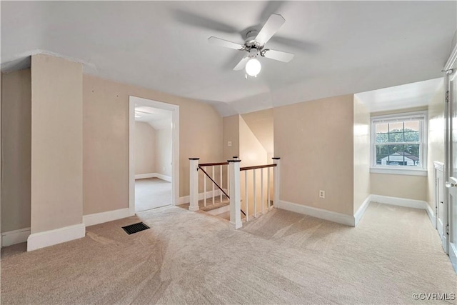 4305 Lakeview Rd, South Chesterfield, VA 23803 - empty room with light carpet, ceiling fan, and vaulted ceiling