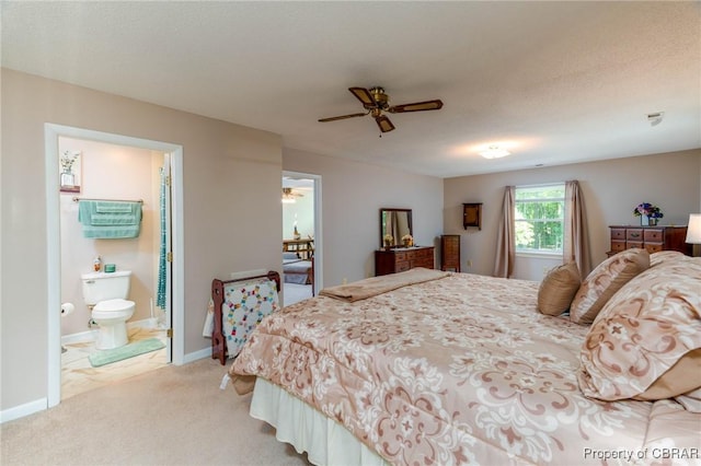 844 Rocky Point Lndg, Cobbs Creek, VA 23035 - bedroom featuring light colored carpet, a ceiling fan, and connected bathroom