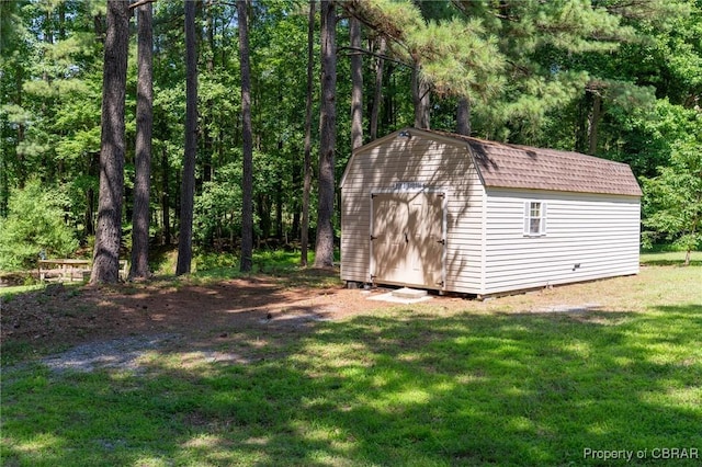 844 Rocky Point Lndg, Cobbs Creek, VA 23035 - view of shed with a view of trees